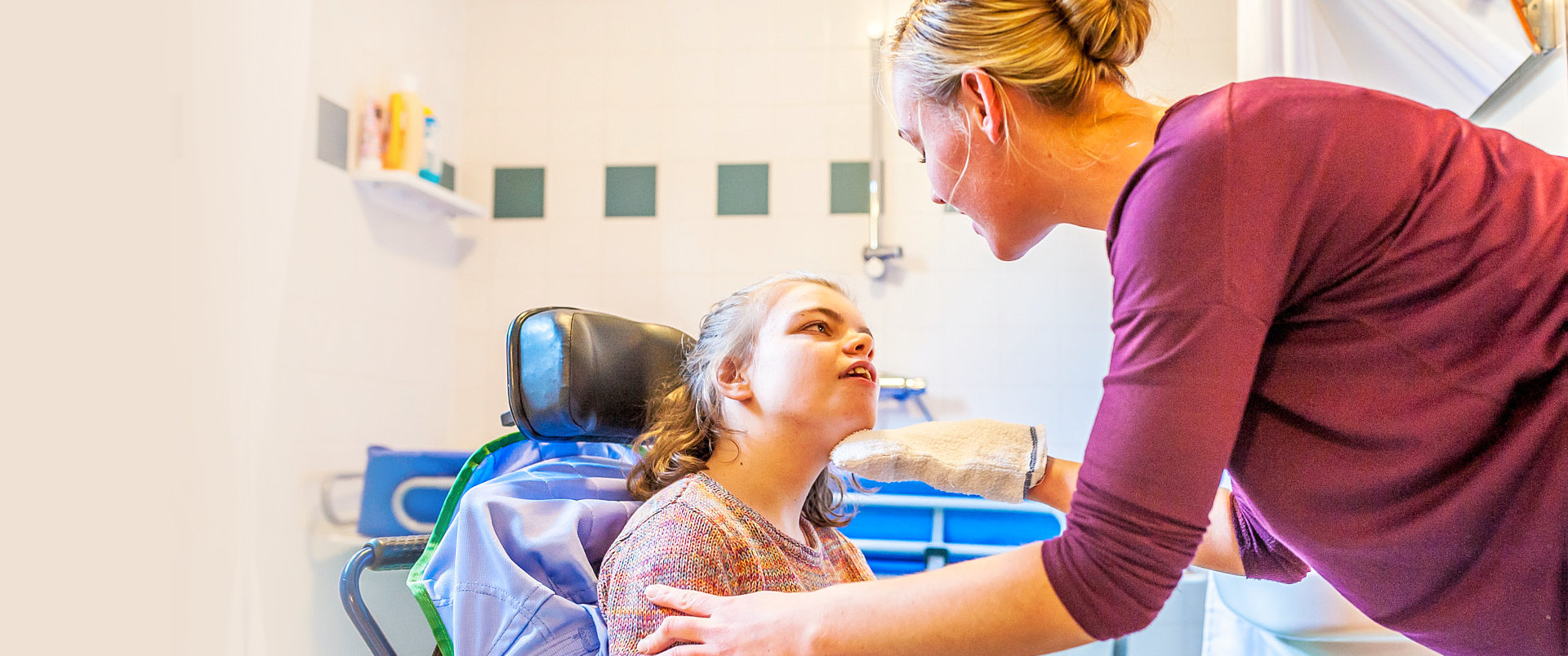 woman talking to little girl